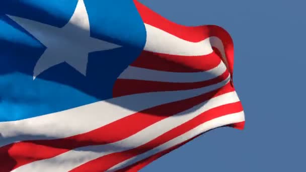 La bandera nacional de Liberia ondea en el viento — Vídeos de Stock