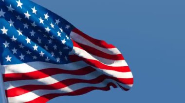Amerika Birleşik Devletleri bayrağı rüzgârda dalgalanıyor.