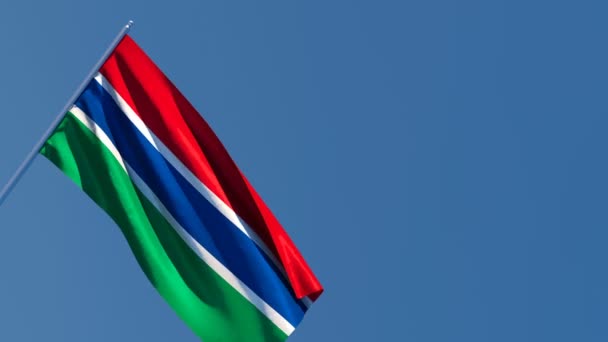 La bandera nacional de Gambia ondea con el viento — Vídeo de stock