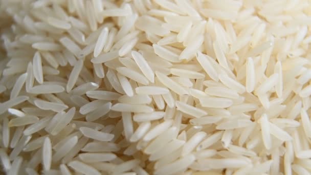 Купа сирого рису рухається повільно — стокове відео