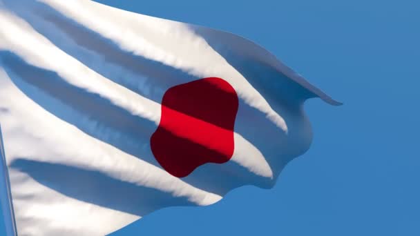 Japonská národní vlajka vlaje ve větru proti modré obloze — Stock video