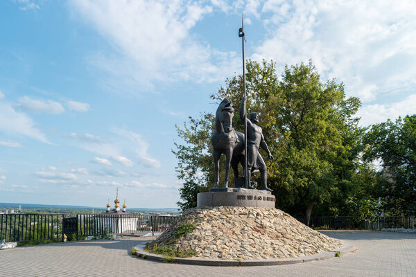 Penza, Russia - August 26, 2017: Monument to the First Settler. Overlooking the monastery.