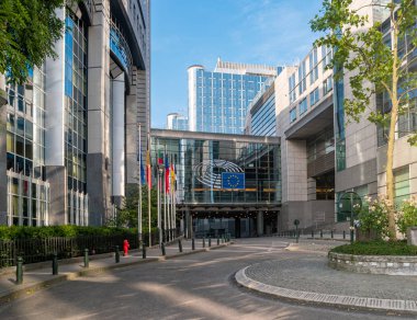 Brussels, Belgium- July 3, 2019: Emblem of the legislative and government Institutions of the European Union on the European Parliament building in belgian capital.