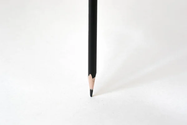 black pencil on white