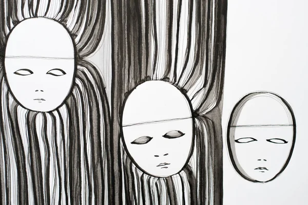 sad faces painted on paper