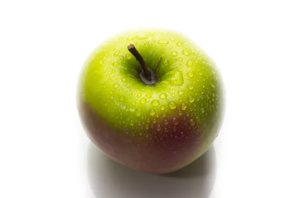 A red and green apple with water drops isolated on a white background. — Stock Photo, Image