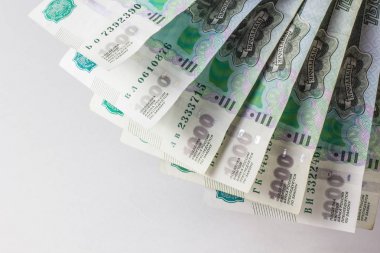 Bir sürü beyaz bir arka plan üzerinde para fan