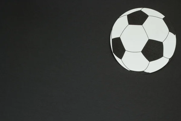 Old soccer ball isolated on black background — Stock Photo, Image