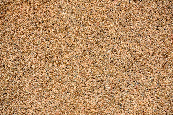 Texture washed sand background.Small sand stone of sand wall texture or sand wall background. floor background texture. wash gravel, wash stone