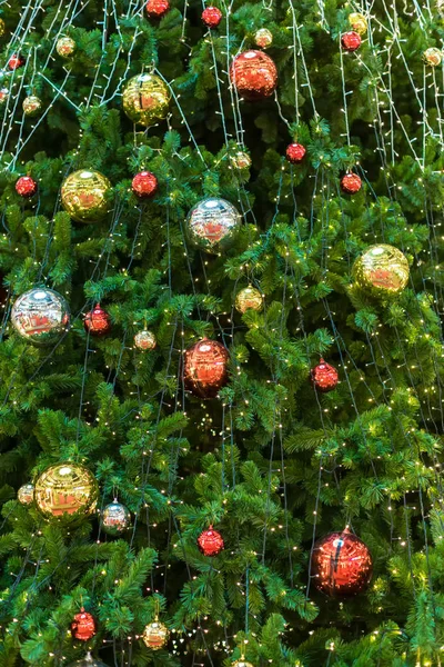 Christmas toy, ball decoration on christmas tree with blur background. christmas festival. giving season. funny holidays for kids. image for background, wallpaper, objects and copy space.