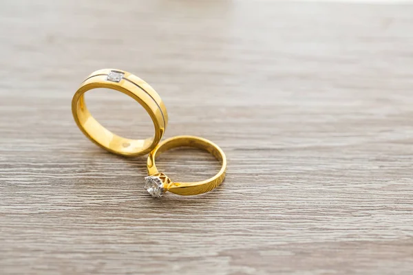 gold wedding rings on a white background