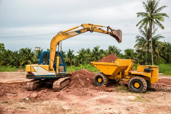 excavator on the road