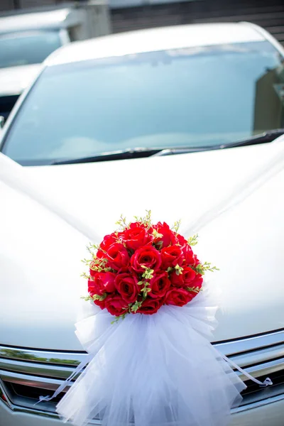 wedding bouquet of roses in the car