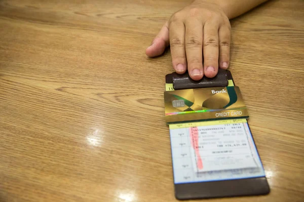 Hand Holding Credit Card Smartphone Calculator Wooden Table — Foto de Stock