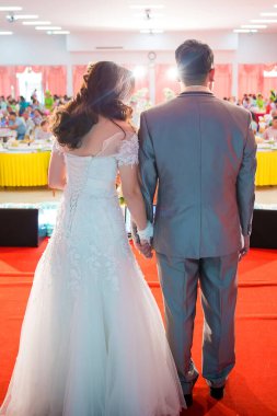 beautiful young couple in the wedding dress