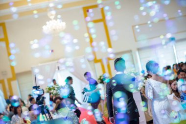 blurred image of people at the mall