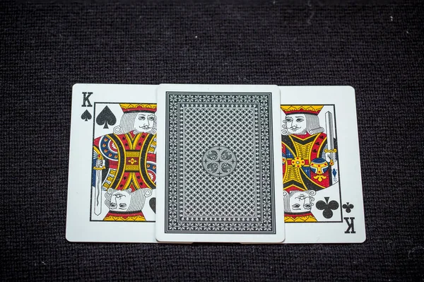 playing cards on a black background