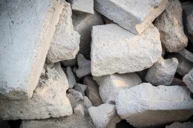 tuğla kare inşaat malzemeleri grubu. tuğla doku ve soyut arka plan veya metin doldurmak için kopya alanı için vinyet. Düzensiz kahverengi tuğla yığını.