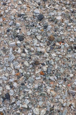 Taşların dokusu ve arkaplanı. Kaya dokusu. Ezilmiş çakıl zemini. Arkaplan için çakılların kusursuz dokusu. 