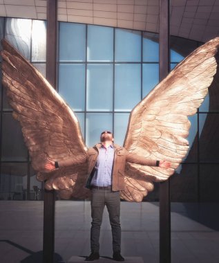 active winner man with wings clipart