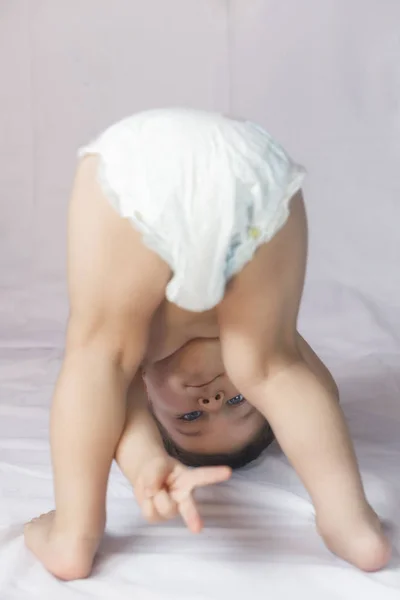 Cheerful Kid Diapers Looks Legs — Stock Photo, Image