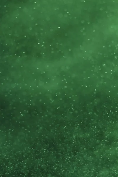 abstract and green particles background