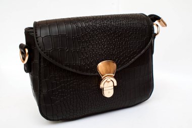 Beyaz arka plan üzerinde izole kadın altın çanta. İzole altın el çantası