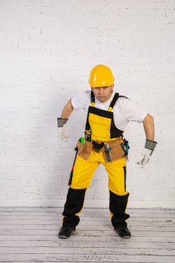 A professional building fitter ready for action at any time.