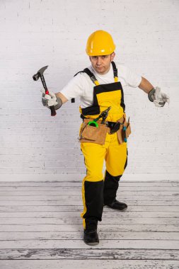 A professional building fitter ready for action at any time.