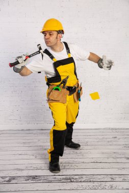 A professional building fitter ready for action at any time.