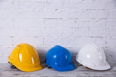 A protective helmet is necessary for any construction work.
