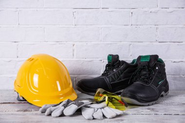 A protective helmet is necessary for any construction work.