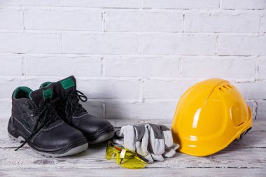 A protective helmet is necessary for any construction work.