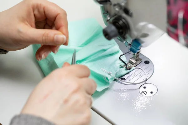 Each piece of fabric has to go through the entire production process from design through cutting to sewing.