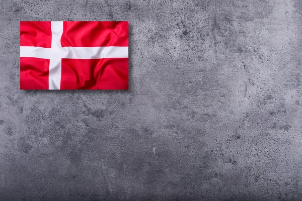 Příznaky z Dánska na konkrétní pozadí — Stock fotografie