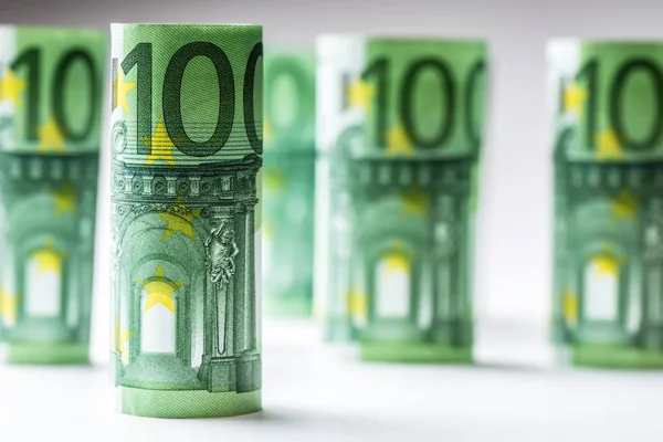 Several hundred euro banknotes stacked by value.Rolls Euro banknotes.Euro currency money. Banknotes stacked on each other in different positions — Stock Photo, Image