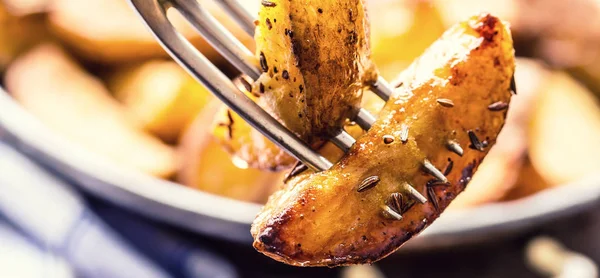 Potato. Roasted potatoes. American potatoes with salt pepper and cumin. Roasted potato wedges delicious crispy
