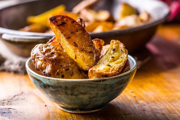 Potato. Roasted potatoes. American potatoes with salt pepper and cumin. Roasted potato wedges delicious crispy — Stock Photo, Image