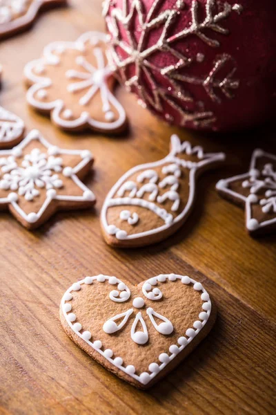 Christmas sweet cakes. Christmas homemade gingerbread cookies on wooden table