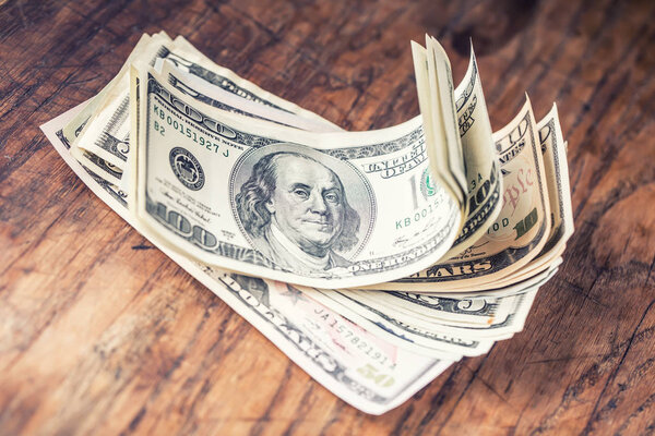 Банкноты за доллары крупным планом. Cash Money American Dollars.Closup view of stack of US Dollars
