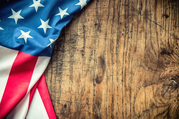 USA flag. American flag. American flag freely lying on wooden board. Close-up Studio shot. Toned Photo — Stock Photo, Image