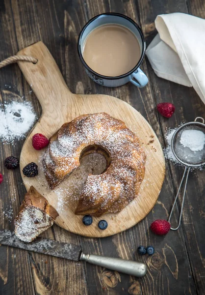 Cake. Marble cake cup of coffee powder sugar kitchen vintage utensil and fresh fruit berries — Stock Photo, Image