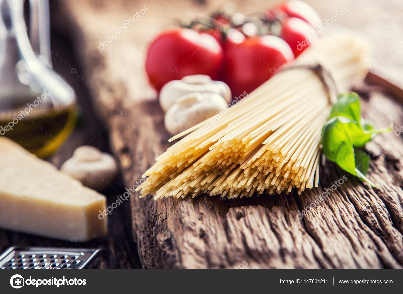 Spaghetti.Spaghetti tomatoes basil olive oil parmesan cheese and