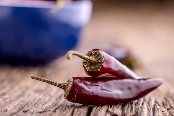 Chili.Red chili peppers on wooden table. Selective focus — Stock Photo, Image