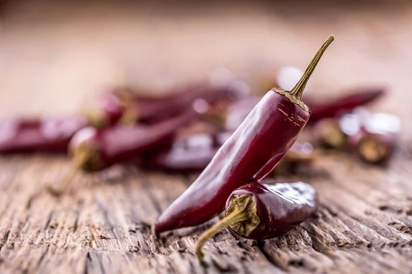 Chili.Red chili peppers on wooden table. Selective focus — Stock Photo, Image