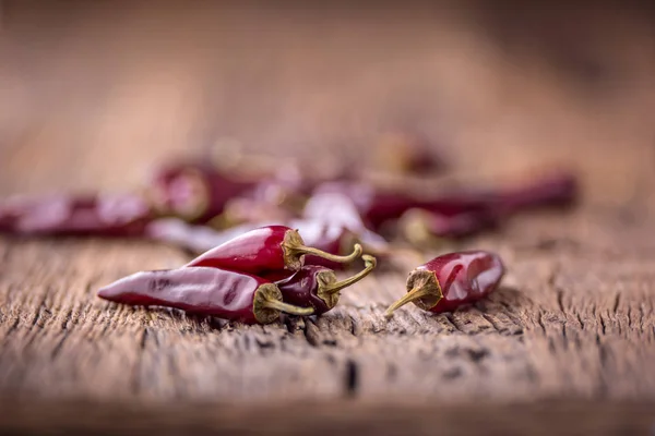 Chili.Red chili peppers on wooden table. Selective focus — Stock Photo, Image