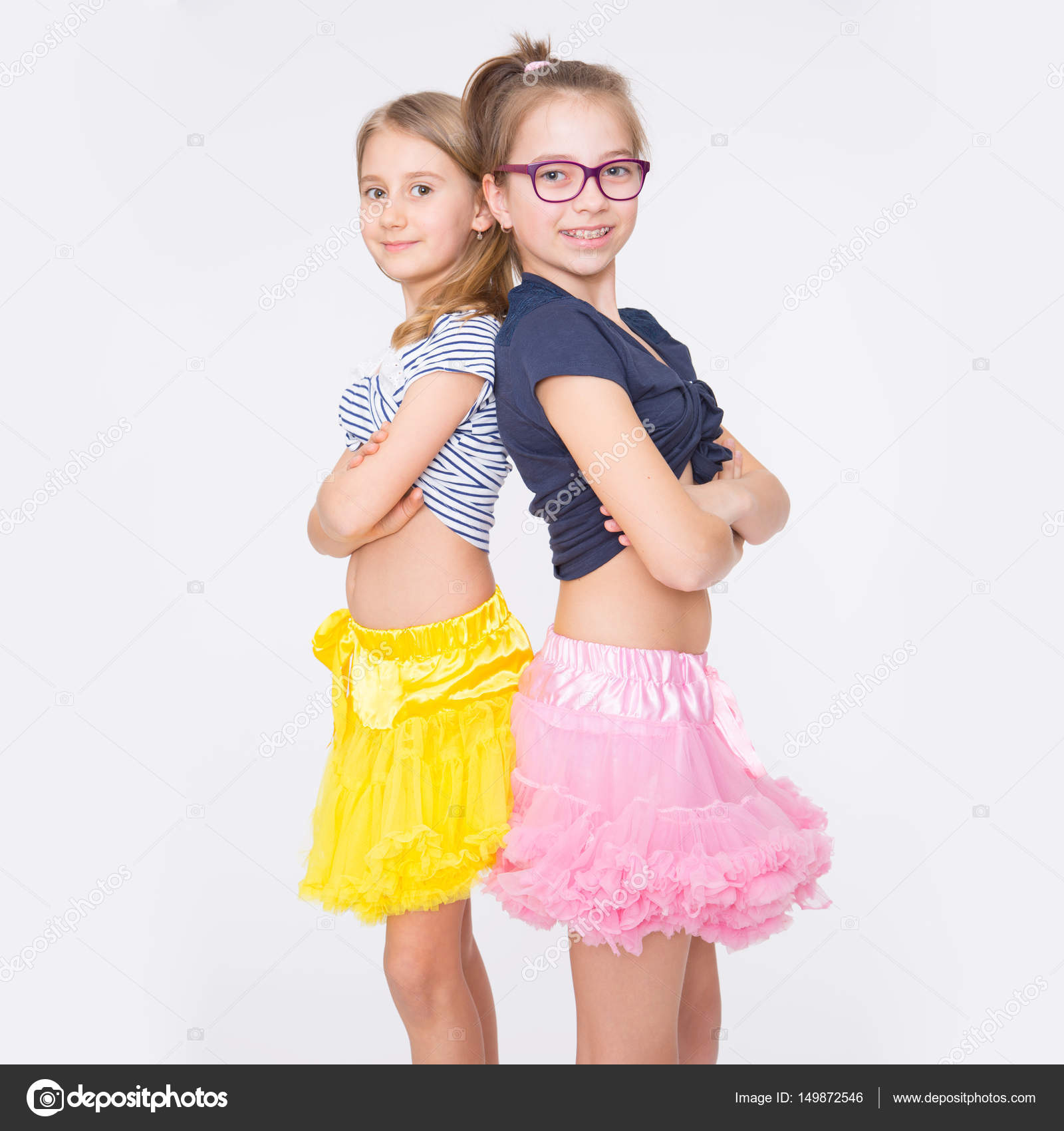 Playful Young Naughty Sisters Having Fun Stock Photo Playful Young Naughty Sisters Having Fun Stock Photo