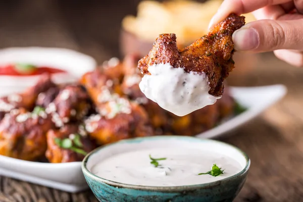 Chicken wings. Fried chicken wings in white bowl garlic dressing ketchup and potato fries — Stock Photo, Image