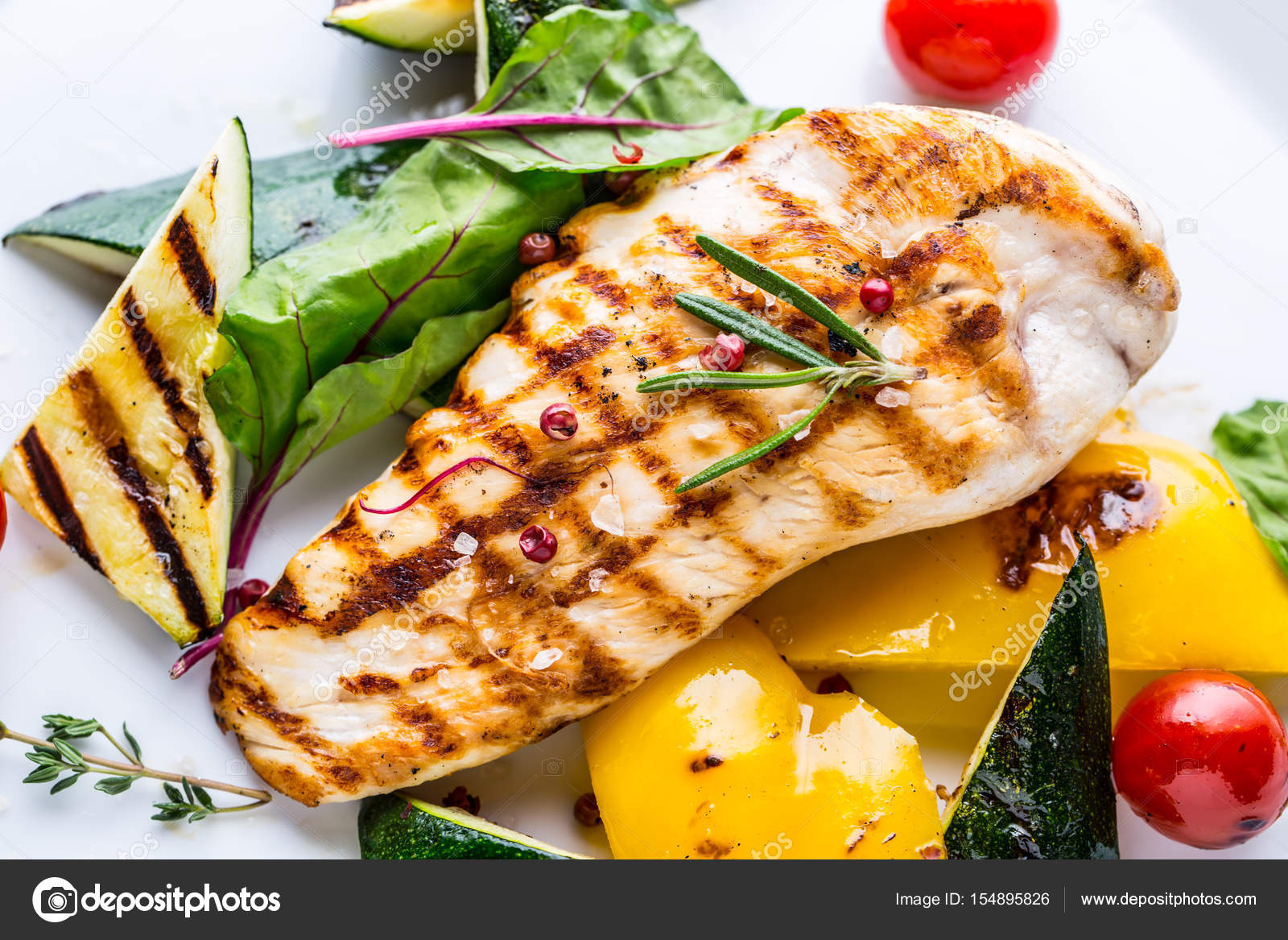 Grill chicken breast. Grilled vegetables with chicken breast. Grilled