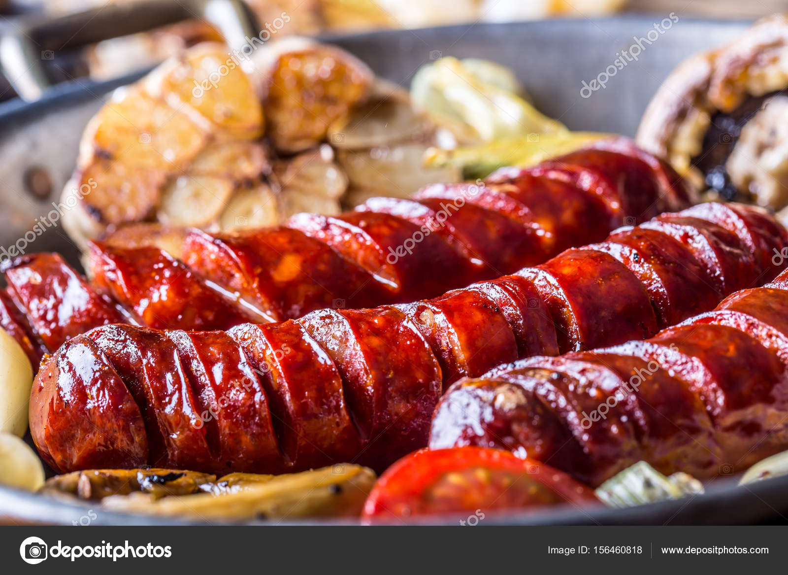 Sausages. Grill sausages. Grilled sausage with mushrooms garlic